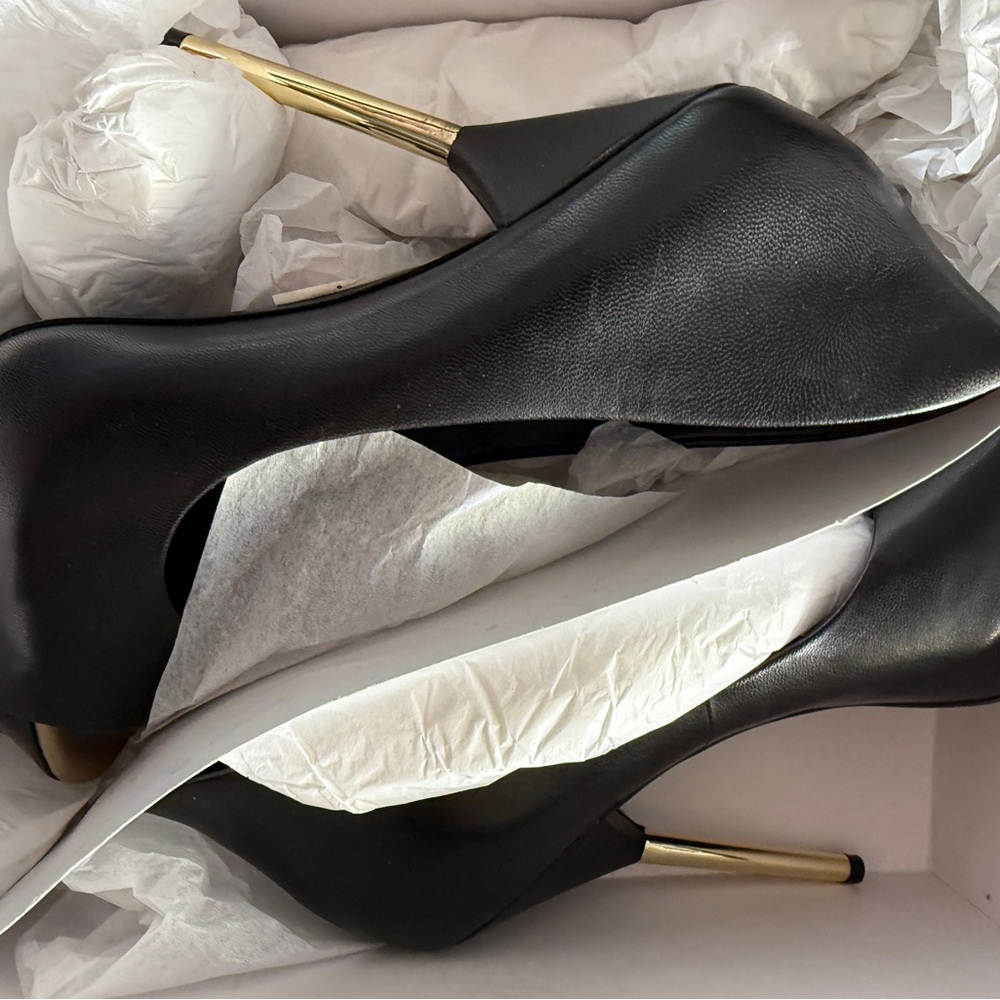 Elegant Black Heels with Gold Accents